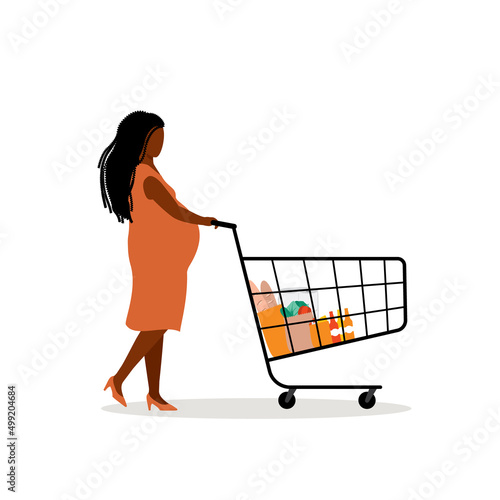 Side View Of A Young Black Pregnant Woman Pushing A Shopping Cart With Groceries Item Inside.