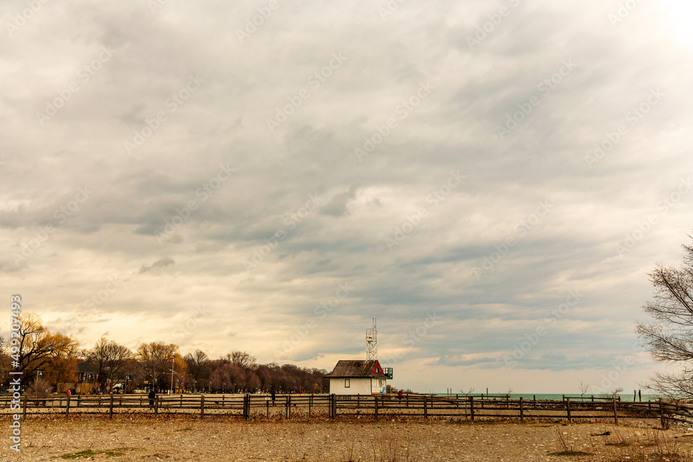 Rain clouds over the Leuty Lifeguard Station in the Toronto Beaches on a spring day.  Room for text.  NB: this is a Blue Flag Beach