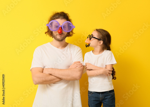Funny man and her little da...
