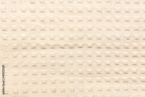 Texture of embossed paper as background, closeup
