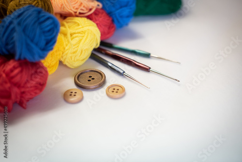 knitting hobbies of yarn ball for background. colorful wool balls of knitted yarn. The concept of handmade work, needlework and the sale of thread. Top view.Flatlаy.Rainbow layout. Copy space.