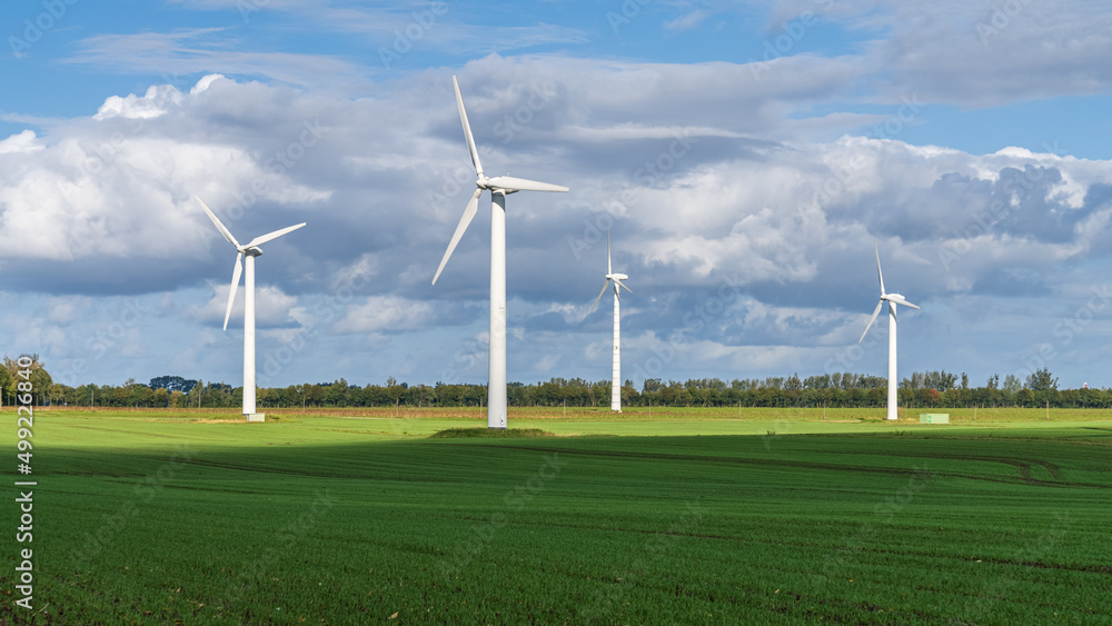 Wind turbines on a field near Altefaehr, Mecklenburg-Western Pomerania, Germany Wind turbines on a field near Altefaehr, Mecklenburg-Western Pomerania, Germany