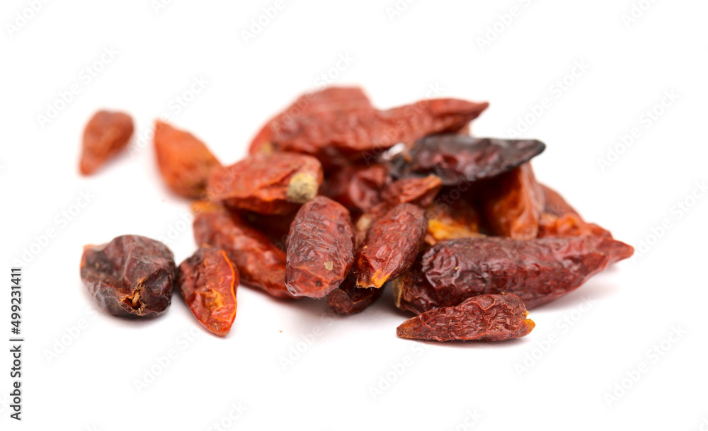 dry small bird eye chili peppers isolated on white background 
