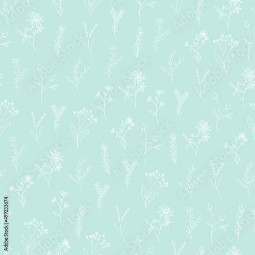Delicate floral seamless pattern. Elegant flowers on a blue background. Vintage silhouette of herbs and leaves. Botanical vector design for wedding, spa salon, organic cosmetics.