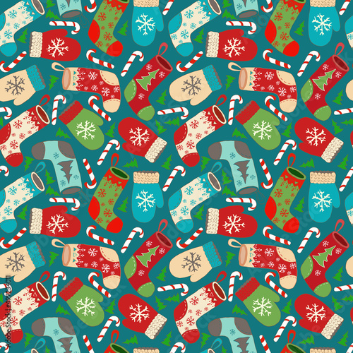 christmas paper vector design Christmas boot, tree, snow, candy on a blue background, seamless pattern