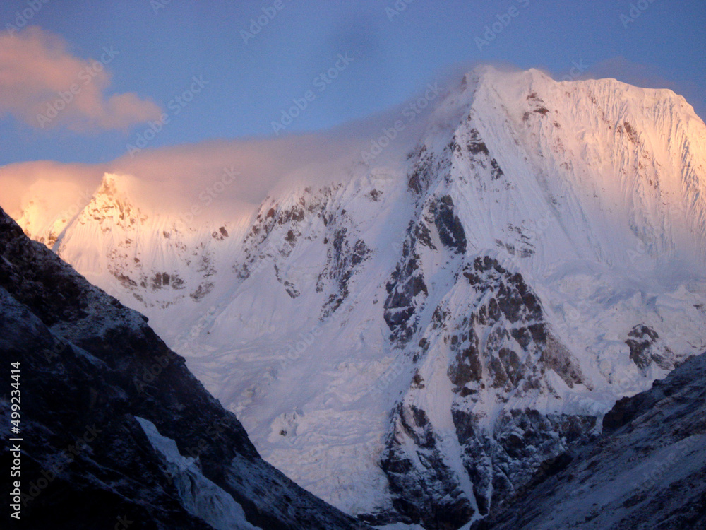 A magnificient view of Mt. Kangchengyao Peak 6889 mtr during sunrise as seen from the base camp in North Sikkim.