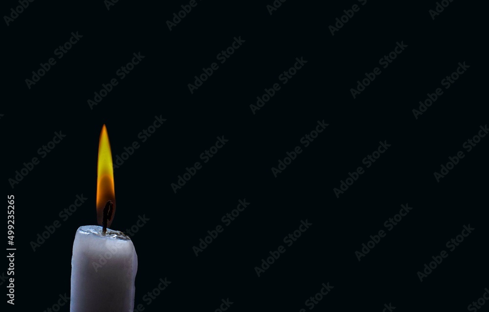 Candle light in darkness as light for life. Candle light in darkness as light for life.