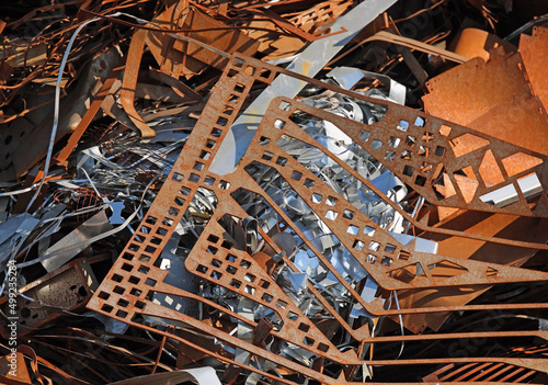 rusty scrap in a recycling shop where ferrous material residues are collected photo