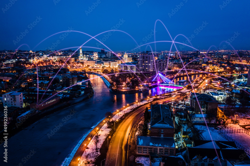 Concept of 5g networks in large digital citiy. Night cityscape with global connection technology design. Media technology innovation
