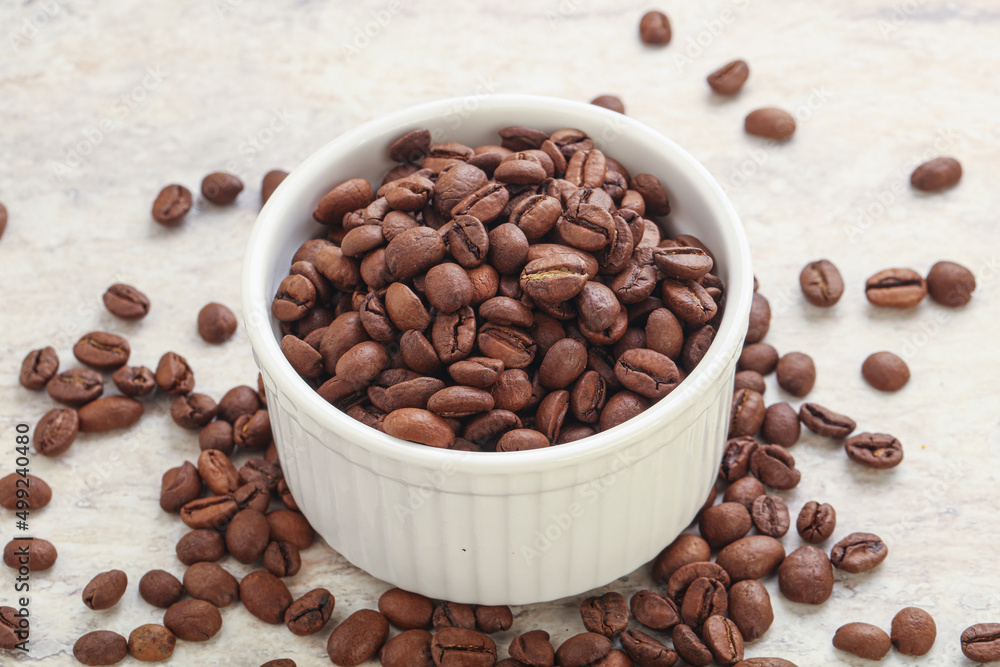 Roasted coffee bean in the bowl Roasted coffee bean in the bowl