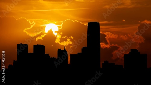 Oklahoma City Skyline at Sunset: Time Lapse with Red Sky and Fiery Sun, USA photo