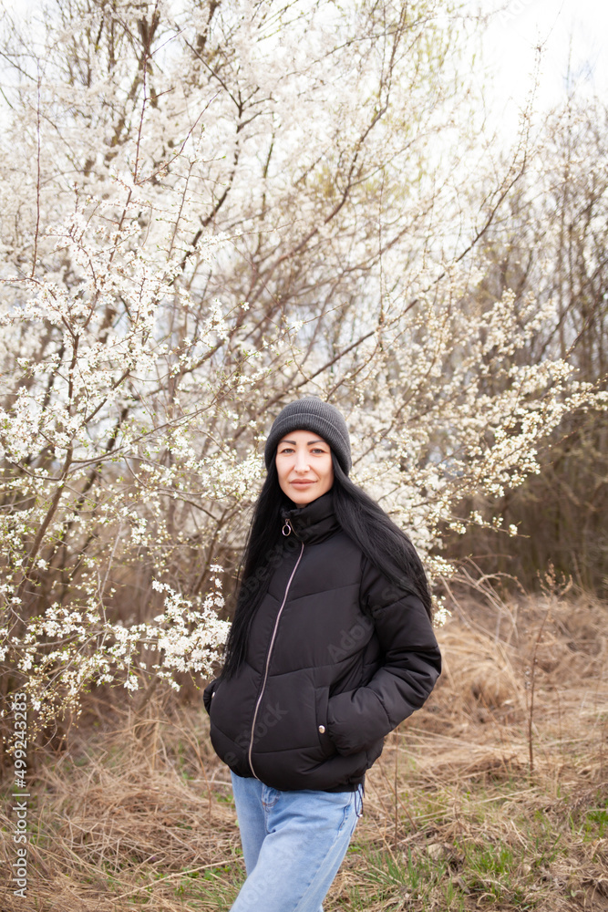 Springtime photoshoot, sunny day. Portrait of a happy woman.
Springtime photoshoot, sunny day. Portrait of a happy woman.