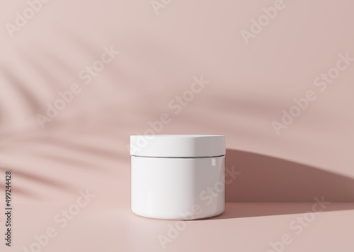 Photo White and blank, unbranded cosmetic cream jar with leaves shadows on pink background