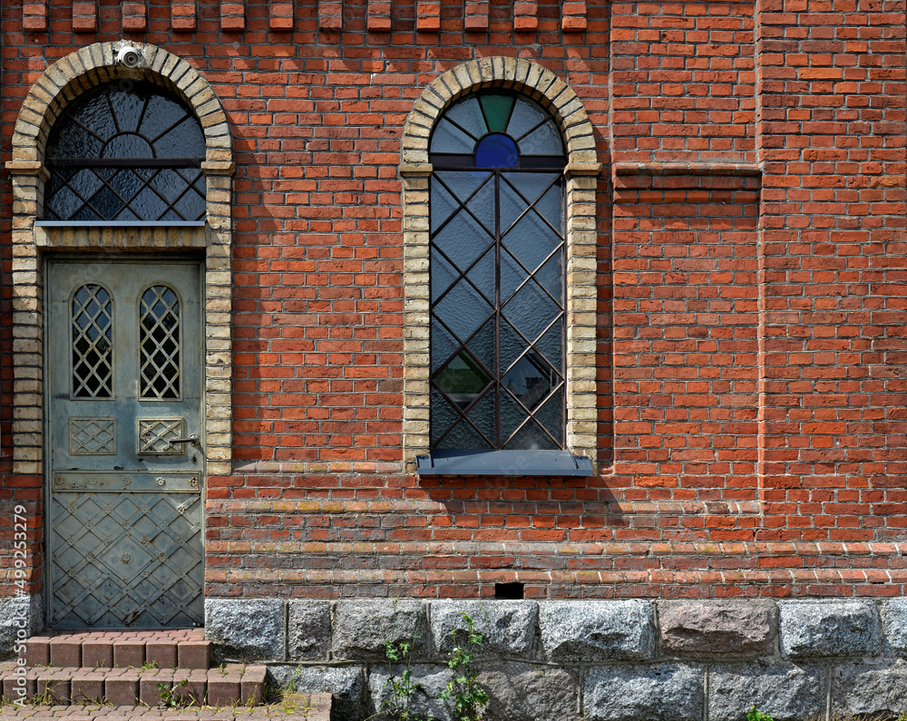General view and architectural details of a close-up of the Catholic church of St. Michael the Archangel built at the turn of the 19th and 20th centuries in Jabłonka Koscielna in Podlasie, Poland. General view and architectural details of a close-up of the Catholic church of St. Michael the Archangel built at the turn of the 19th and 20th centuries in Jabłonka Koscielna in Podlasie, Poland.