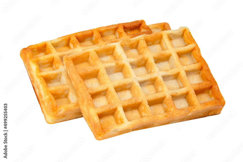 Belgian waffles with chocolate syrup baked tasty isolated on the white background Belgian waffles with chocolate syrup baked tasty isolated on the white background