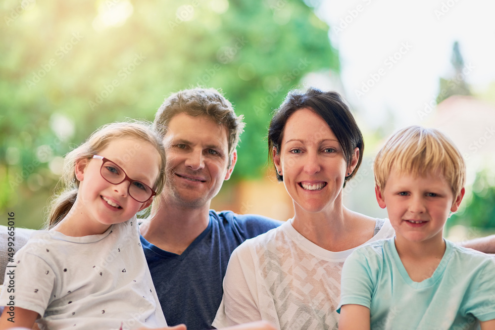 Obraz premium You only need family to truly be happy. Portrait of a happy family bonding together outside.