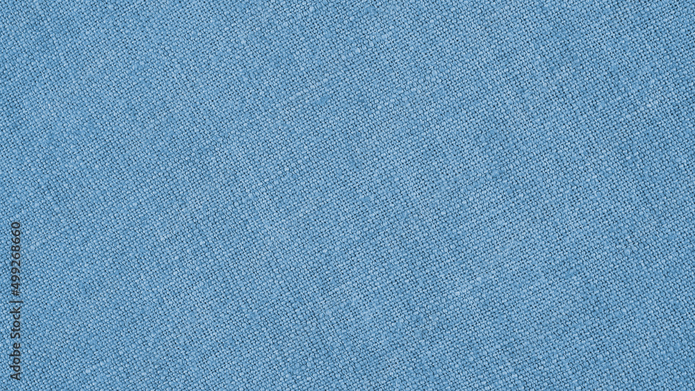 Light blue woven surface closeup. Linen textile texture. Fabric background. Textured braided wallpaper. Macro Light blue woven surface closeup. Linen textile texture. Fabric background. Textured braided wallpaper. Macro
