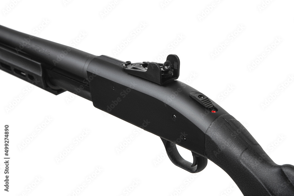 Pump-action 12 gauge shotgun isolated on a white back. Close-up shot of part of a shotgun. A smooth-bore weapon with a plastic stock.
