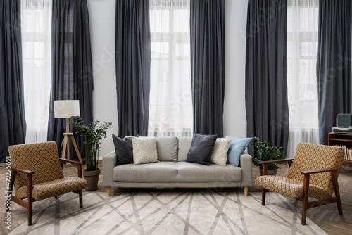 Cozy living room with retro style decor and vintage furniture