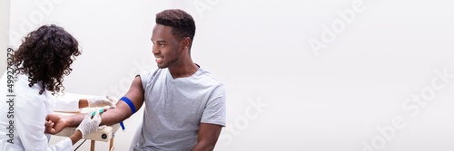 Doctor Taking Blood Sample