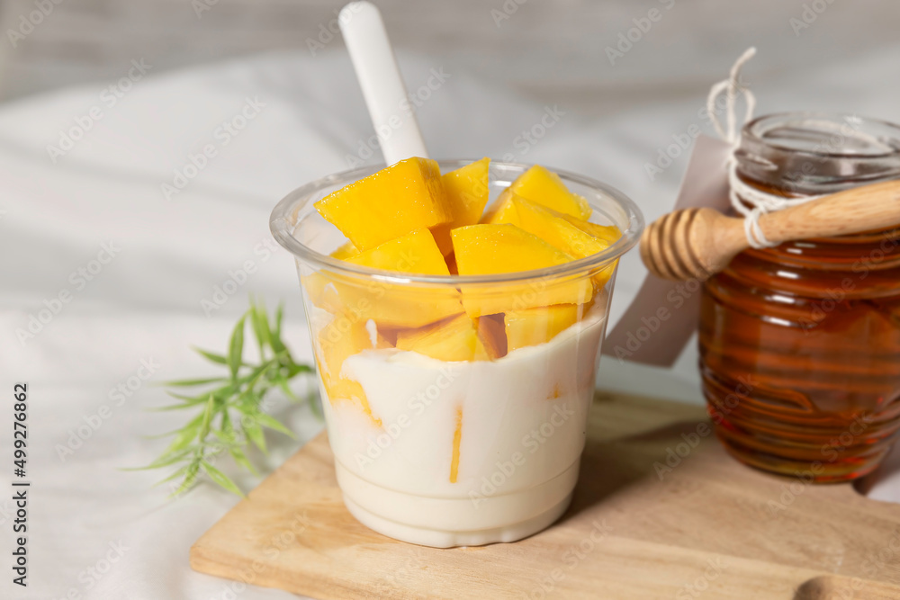 Bowl of fresh yogurt with fruit served for good health. Bowl of fresh yogurt with fruit served for good health.