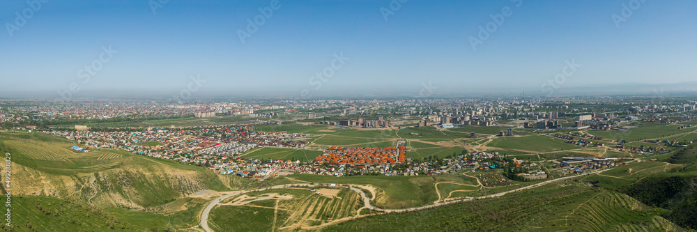 Aerial panoramic view of Bishkek city from the mountains