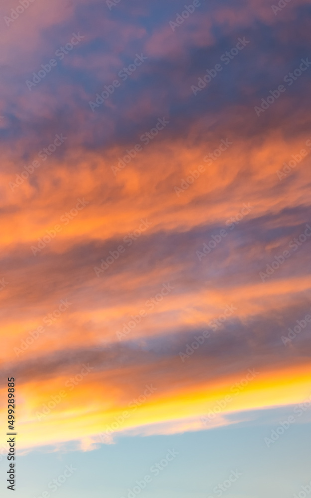 Vibrant colorful clouds in the sky at sunset