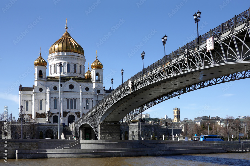Cathedral of Christ the Savior and the Patriarchal Bridge across the Moskva River on a sunny day