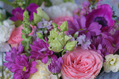 Decorative bouquet of many different small and large flowers