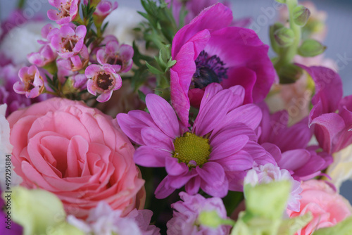 Decorative bouquet of many different small and large flowers