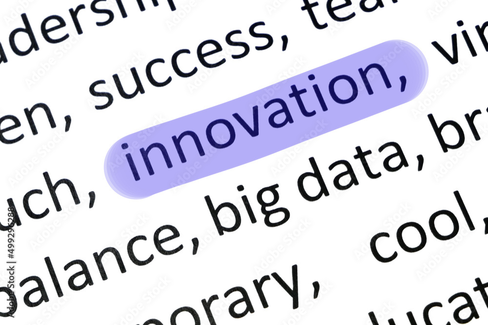 Word innovation undelnines among other words printed on white paper. Innovation is the practical implementation of ideas that result Word innovation undelnines among other words printed on white paper. Innovation is the practical implementation of ideas that result