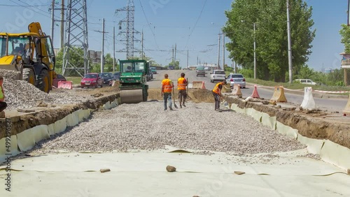 Working bulldozer on the construction of a road timelapse photo