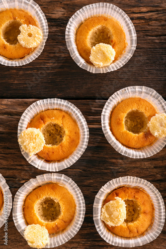 Process of making muffins. Top view. Preparation of vanilla mousting for filling. Vertical frame