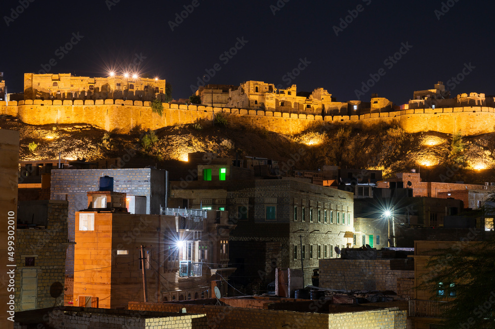 Jaisalmer,Rajasthan,India - October 14, 2019 : Night image of famous Jaisalmer Fort or Sonar Quila or Golden Fort. A 