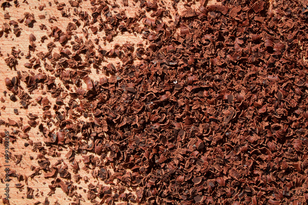 Grated chocolate. Chocolate shavings for sprinkles. Top view Grated chocolate. Chocolate shavings for sprinkles. Top view