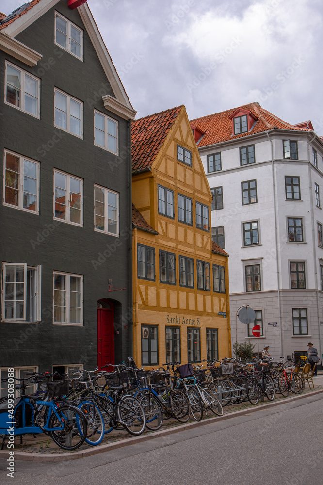 Street with colourful buildings in Copenhagen's old historic center. Denmark.