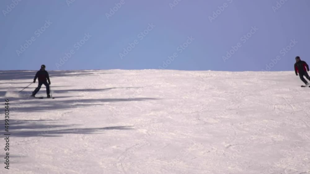 Skier slides down the mountain Skier slides down the mountain