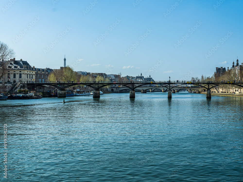 River Seine and Pont des Arts or Passerelle des Arts is a pedestrian bridge in Paris