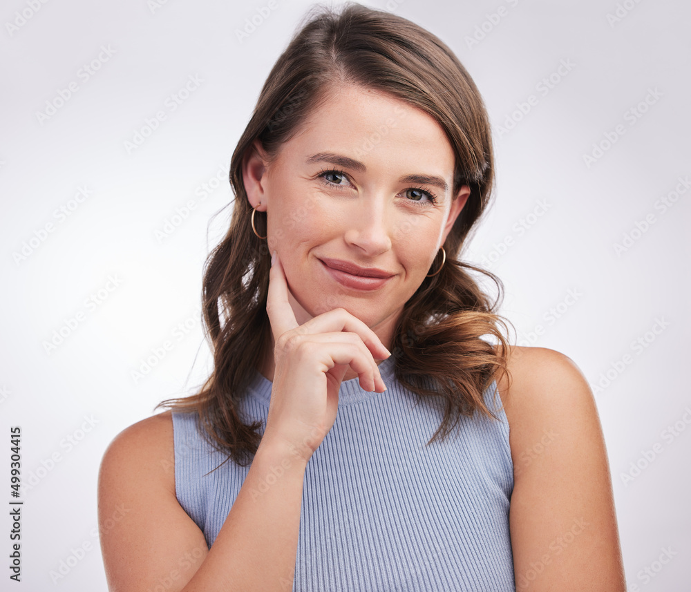 Thinking about all that Im grateful for. Studio portrait of a happy young woman posing against a grey background. Thinking about all that Im grateful for. Studio portrait of a happy young woman posing against a grey background.