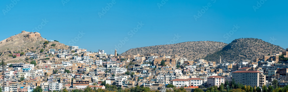 Savur, Mardin, Turkey - January 2020: Town of Savur skyline with old stone houses on a hill