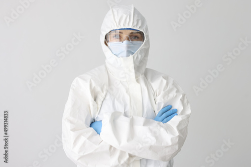 Doctor scientist in protective suit, mask and glasses