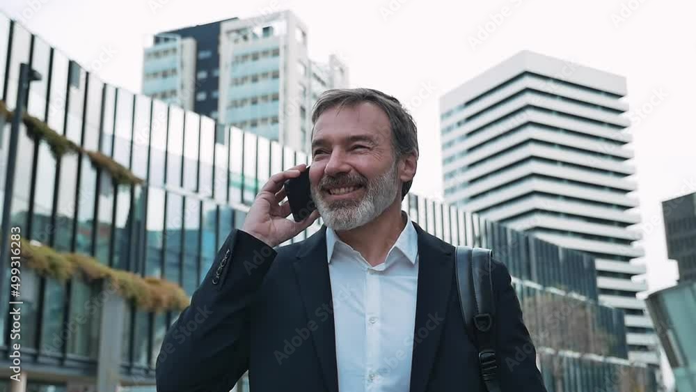 Handsome senior business man working moments. Expert sales person going to work in the morning Handsome senior business man working moments. Expert sales person going to work in the morning