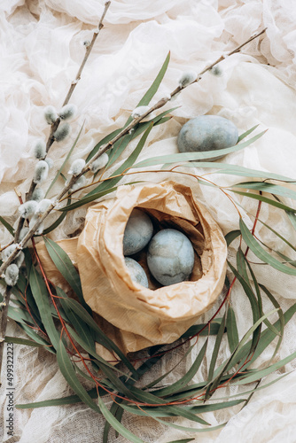 festively decorated Easter eggs painted with natural blue headlights by soaking in tea hyacinth tea photo