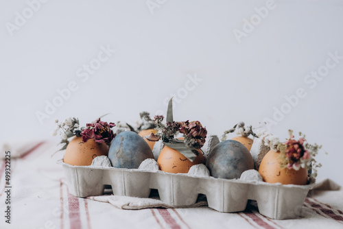 festively decorated Easter eggs painted with natural blue headlights by soaking in tea hyacinth tea photo