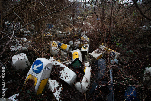 Discarded road signs in dump
