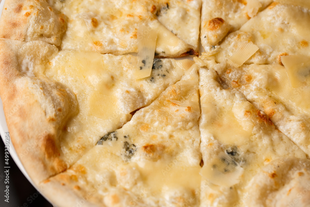 Four cheese pizza quattro formaggi close up photo. Four cheese pizza quattro formaggi close up photo.