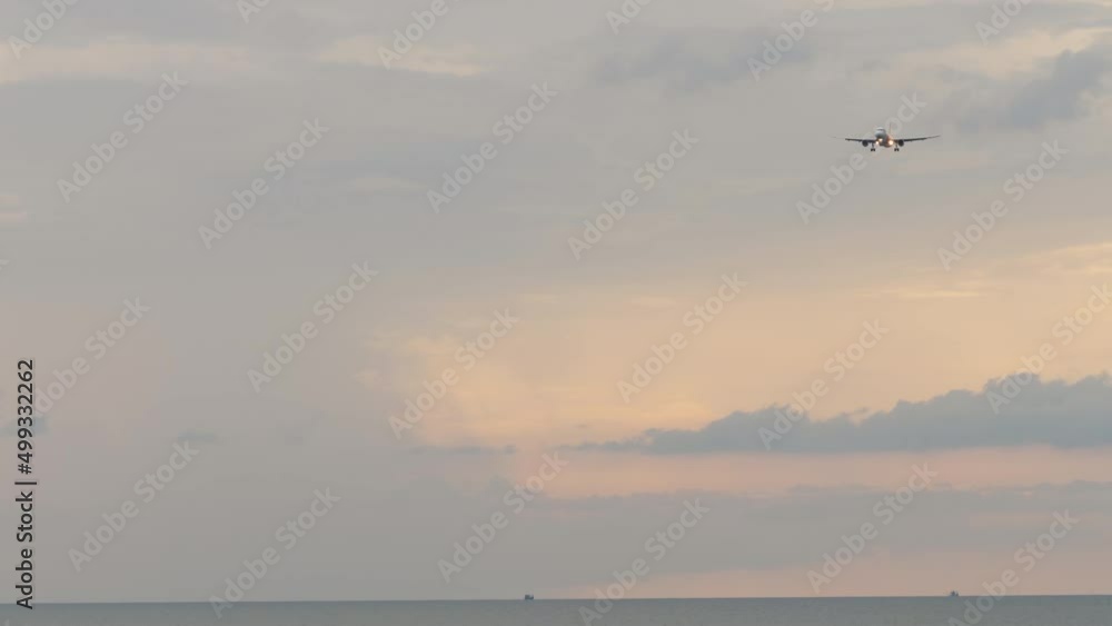 Sea beautiful landscape and passenger plane in flight over the ocean. Air industry, travel and tourism concept Sea beautiful landscape and passenger plane in flight over the ocean. Air industry, travel and tourism concept