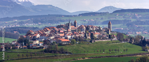 Fotografiet Panorama image of old Swiss town Romont, built on a rock prominence, in Canton F