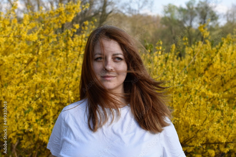 Portret of woman in white shirt on yellow background Portret of woman in white shirt on yellow background