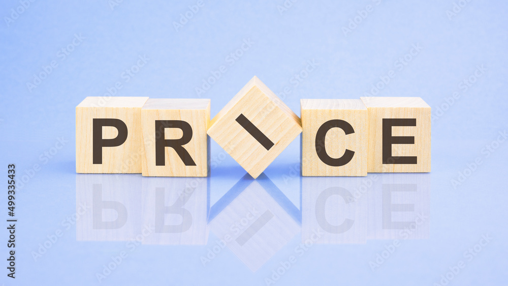 PRICE - word is written on wooden cubes on a blue background. close-up of wooden elements PRICE - word is written on wooden cubes on a blue background. close-up of wooden elements